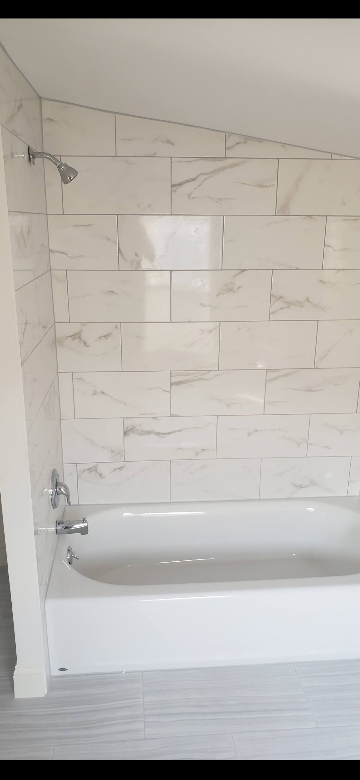 Custom marble tile bathroom remodel by Cavacini Custom Remodel in West Chester, PA