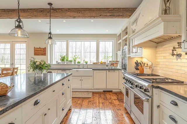 Bright farmhouse kitchen remodel with white cabinets and island, West Chester PA
